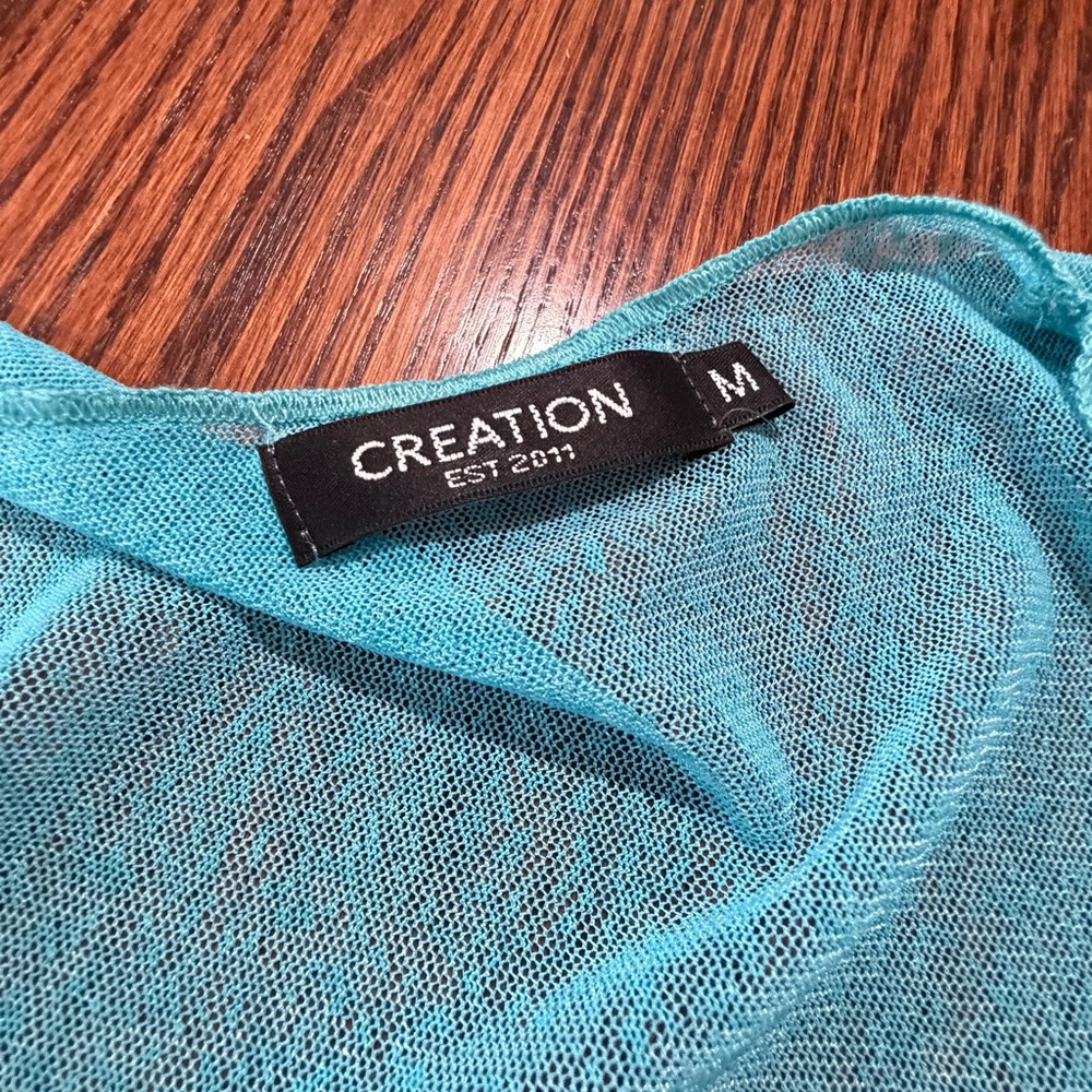 Elegant Sheer Turquoise Poncho - Picture 4 of 5